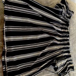 fancy off the shoulder black and white top.